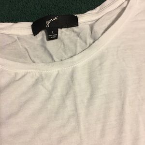 Large, white, super soft, t-shirt.